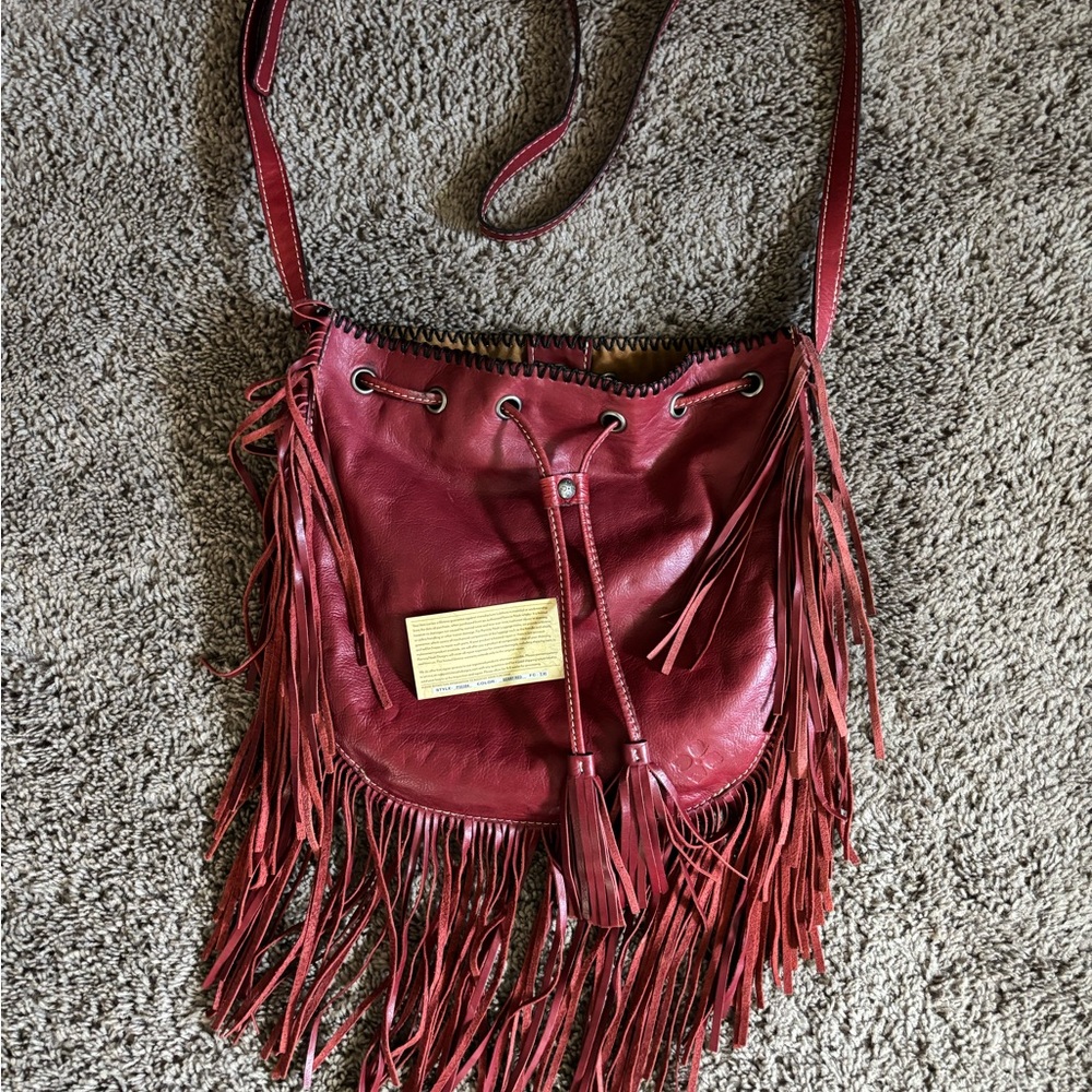Patricia Nash Carrara fringe crossbody bag berry red